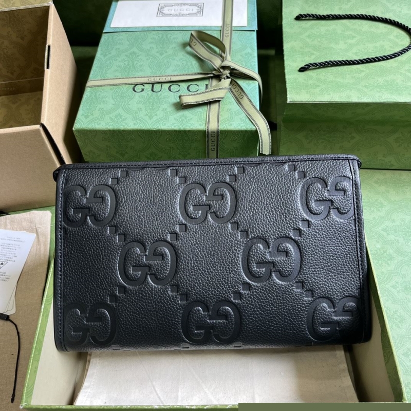 G*u*i clutch bags